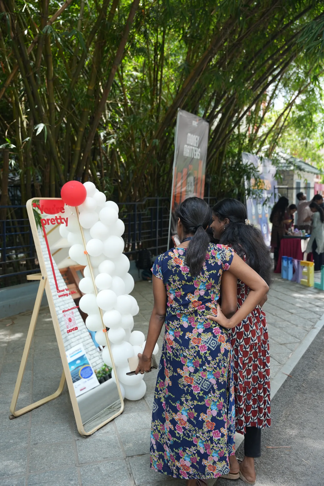 Visitors encountering the mirror installation